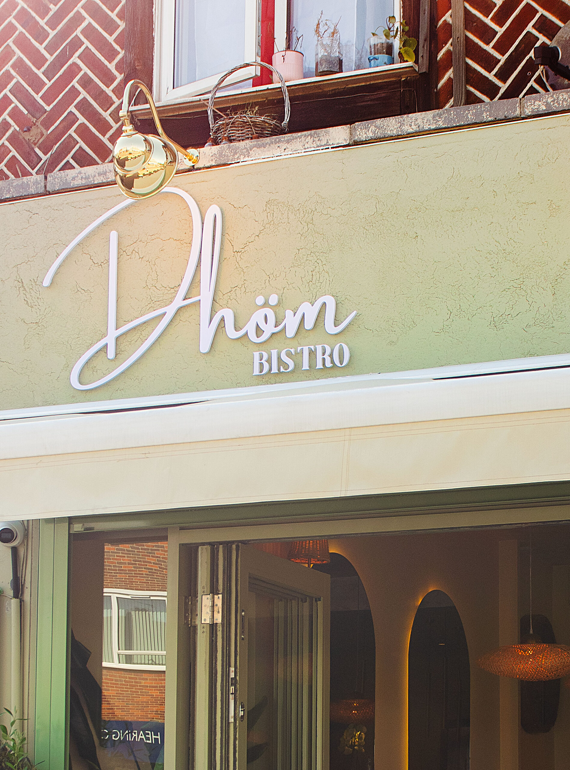 Dhöm Bistro storefront on Darkes Lane